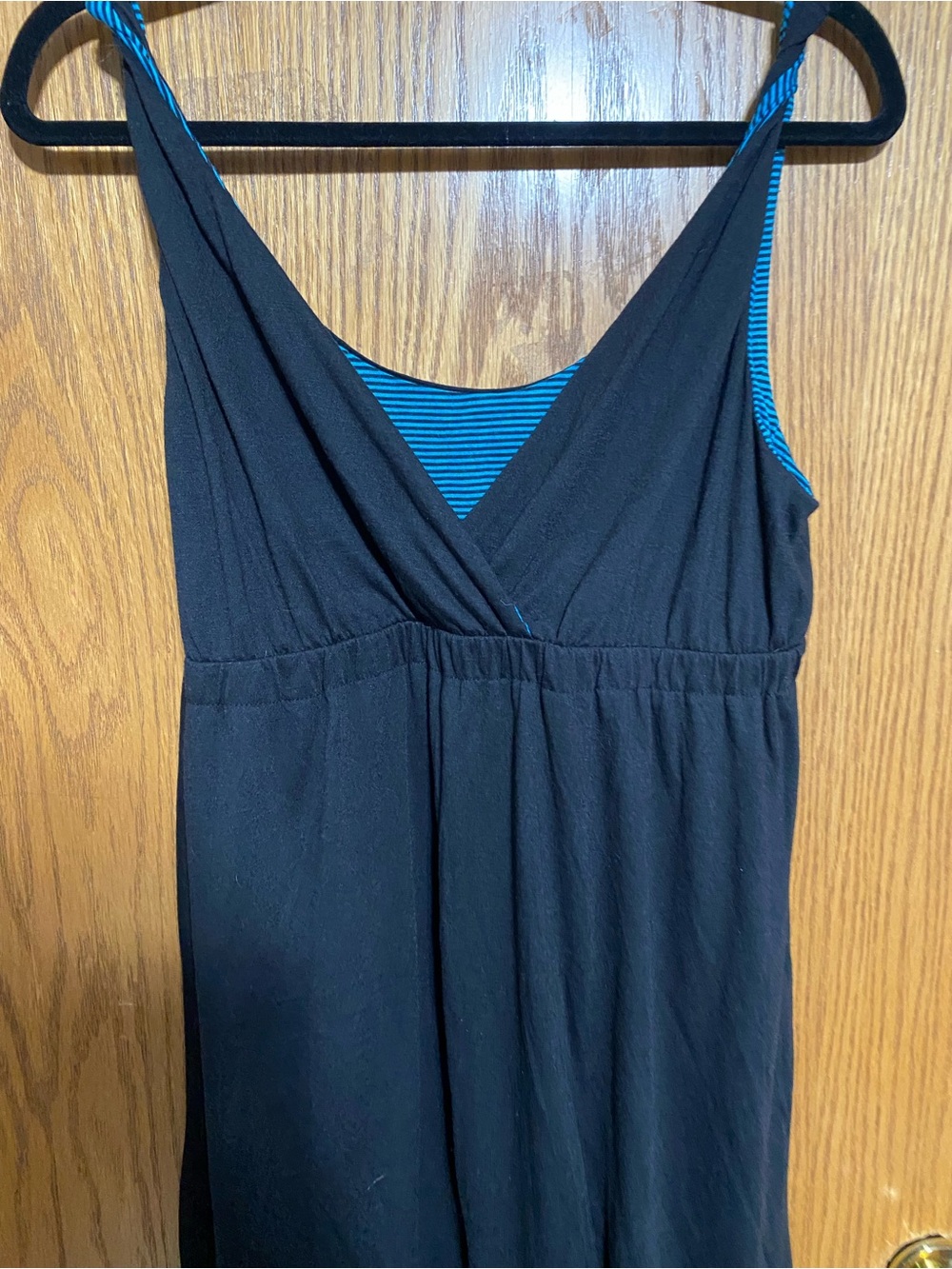 This dress is reverse Black Sleeveless V-Neck Dress